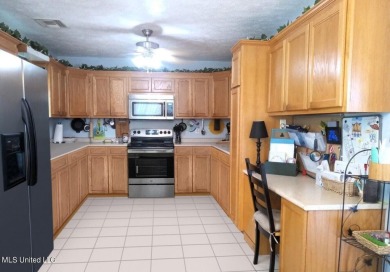 Seller motivated to move: $10,000 offered in concessions or on Pass Christian Isles Golf Club in Mississippi - for sale on GolfHomes.com, golf home, golf lot