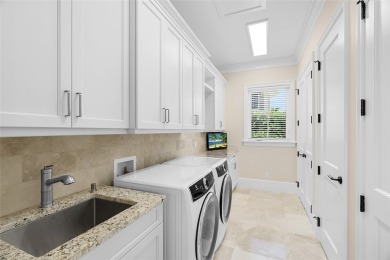 Within the distinguished gates of Orchid Island Beach & Golf on Orchid Island Golf and Beach Club in Florida - for sale on GolfHomes.com, golf home, golf lot
