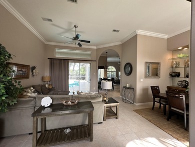 Enjoy the exceptional location of 472 Indigo Loop within the on Emerald Bay Golf Club in Florida - for sale on GolfHomes.com, golf home, golf lot