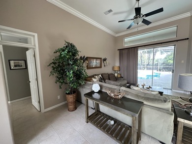 Enjoy the exceptional location of 472 Indigo Loop within the on Emerald Bay Golf Club in Florida - for sale on GolfHomes.com, golf home, golf lot