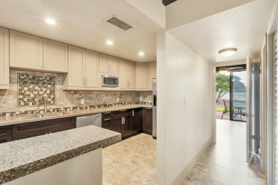 Spacious and updated villa-style condo, 2-story 2-bedroom 2-bath on Jacaranda Golf Club in Florida - for sale on GolfHomes.com, golf home, golf lot
