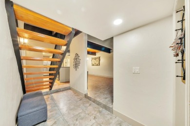 Spacious and updated villa-style condo, 2-story 2-bedroom 2-bath on Jacaranda Golf Club in Florida - for sale on GolfHomes.com, golf home, golf lot