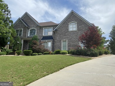 Beautifully positioned on the golf course, this four-sided brick on Canongate At Heron Bay in Georgia - for sale on GolfHomes.com, golf home, golf lot