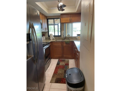 Discover this stunning 2-bedroom, 2-bath 1st-floor corner end on Hideaway Country Club in Florida - for sale on GolfHomes.com, golf home, golf lot