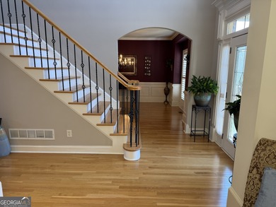 Beautifully positioned on the golf course, this four-sided brick on Canongate At Heron Bay in Georgia - for sale on GolfHomes.com, golf home, golf lot