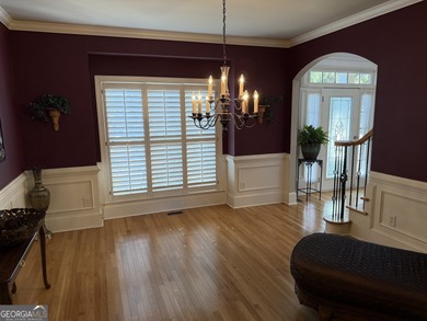 Beautifully positioned on the golf course, this four-sided brick on Canongate At Heron Bay in Georgia - for sale on GolfHomes.com, golf home, golf lot