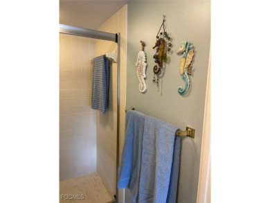 Discover this stunning 2-bedroom, 2-bath 1st-floor corner end on Hideaway Country Club in Florida - for sale on GolfHomes.com, golf home, golf lot