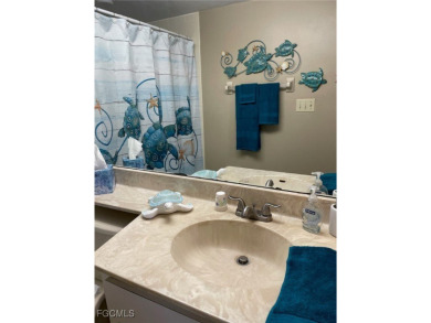 Discover this stunning 2-bedroom, 2-bath 1st-floor corner end on Hideaway Country Club in Florida - for sale on GolfHomes.com, golf home, golf lot
