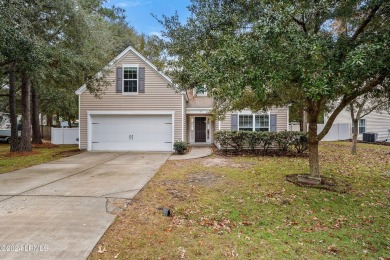 Welcome home to this beautifully well kept 4 bedroom home in the on Ladys Island Country Club in South Carolina - for sale on GolfHomes.com, golf home, golf lot