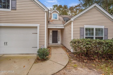 Welcome home to this beautifully well kept 4 bedroom home in the on Ladys Island Country Club in South Carolina - for sale on GolfHomes.com, golf home, golf lot