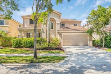 Beautiful 5/4 pool home in the A+ school district and highly on Weston Hills Country Club in Florida - for sale on GolfHomes.com, golf home, golf lot