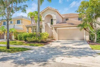 Beautiful 5/4 pool home in the A+ school district and highly on Weston Hills Country Club in Florida - for sale on GolfHomes.com, golf home, golf lot