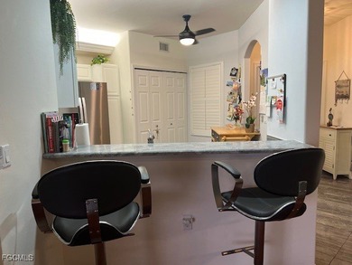 ENJOY PEACEFUL and Tranquil Lake Views in this First Floor 2 on Colonial Country Club in Florida - for sale on GolfHomes.com, golf home, golf lot