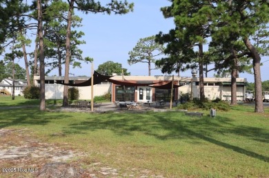 This stunning new home by Langbeen Builders, Inc., a on The Lakes Country Club in North Carolina - for sale on GolfHomes.com, golf home, golf lot