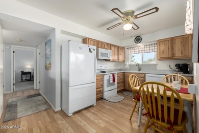 Welcome home to this charming end unit in the active adult Sun on  in Arizona - for sale on GolfHomes.com, golf home, golf lot