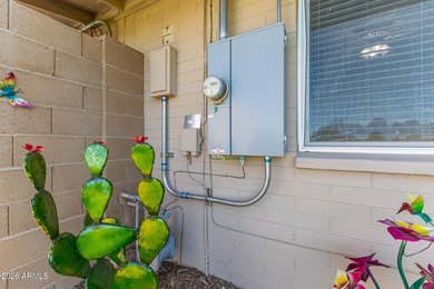 Welcome home to this charming end unit in the active adult Sun on  in Arizona - for sale on GolfHomes.com, golf home, golf lot