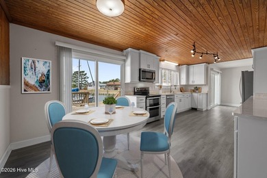 Spectacular water views from nearly every room make this home on Harbour Point Golf Club in North Carolina - for sale on GolfHomes.com, golf home, golf lot