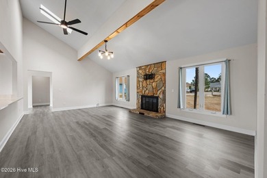 Spectacular water views from nearly every room make this home on Harbour Point Golf Club in North Carolina - for sale on GolfHomes.com, golf home, golf lot