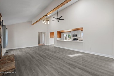 Spectacular water views from nearly every room make this home on Harbour Point Golf Club in North Carolina - for sale on GolfHomes.com, golf home, golf lot