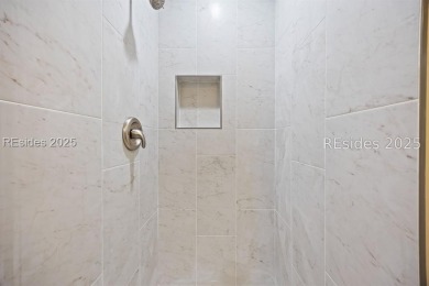 Discover this beautifully maintained 3-bedroom, 3-bath home at on Oyster Reef Golf Course in South Carolina - for sale on GolfHomes.com, golf home, golf lot