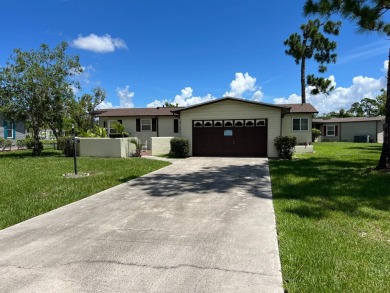 This home needs a little TLC and is priced at $25,000 for a on Pine Lakes Country Club in Florida - for sale on GolfHomes.com, golf home, golf lot