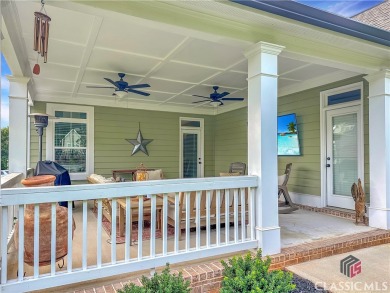 Welcome to this sought after double sided walkway gated on Monroe Golf and Country Club in Georgia - for sale on GolfHomes.com, golf home, golf lot