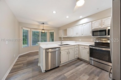 Discover this beautifully maintained 3-bedroom, 3-bath home at on Oyster Reef Golf Course in South Carolina - for sale on GolfHomes.com, golf home, golf lot