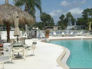 This home needs a little TLC and is priced at $25,000 for a on Pine Lakes Country Club in Florida - for sale on GolfHomes.com, golf home, golf lot