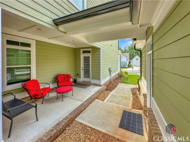 Welcome to this sought after double sided walkway gated on Monroe Golf and Country Club in Georgia - for sale on GolfHomes.com, golf home, golf lot