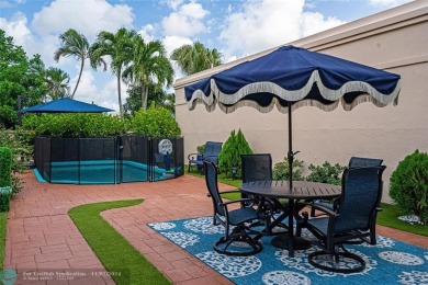 Experience Luxury TOTALLY REMODELED FROM TOP TO BOTTOM 2BD + on Deer Creek Golf Club in Florida - for sale on GolfHomes.com, golf home, golf lot