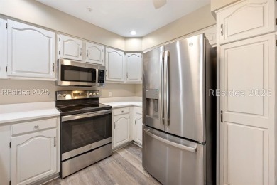 Discover this beautifully maintained 3-bedroom, 3-bath home at on Oyster Reef Golf Course in South Carolina - for sale on GolfHomes.com, golf home, golf lot