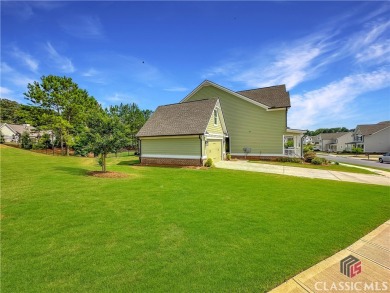 Welcome to this sought after double sided walkway gated on Monroe Golf and Country Club in Georgia - for sale on GolfHomes.com, golf home, golf lot