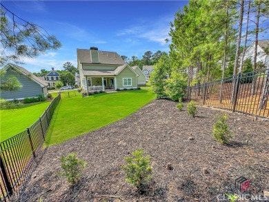 Welcome to this sought after double sided walkway gated on Monroe Golf and Country Club in Georgia - for sale on GolfHomes.com, golf home, golf lot