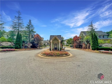 Welcome to this sought after double sided walkway gated on Monroe Golf and Country Club in Georgia - for sale on GolfHomes.com, golf home, golf lot