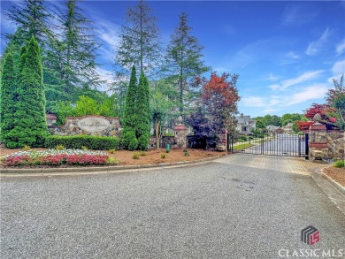 Welcome to this sought after double sided walkway gated on Monroe Golf and Country Club in Georgia - for sale on GolfHomes.com, golf home, golf lot