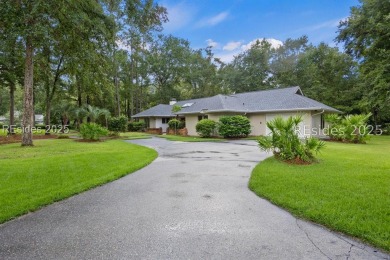 Discover this beautifully maintained 3-bedroom, 3-bath home at on Oyster Reef Golf Course in South Carolina - for sale on GolfHomes.com, golf home, golf lot