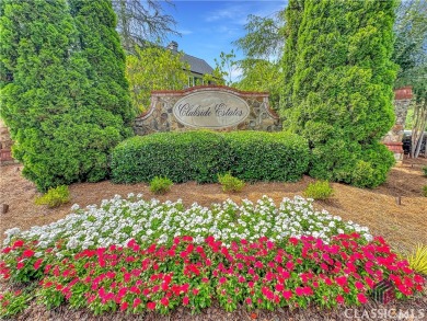 Welcome to this sought after double sided walkway gated on Monroe Golf and Country Club in Georgia - for sale on GolfHomes.com, golf home, golf lot