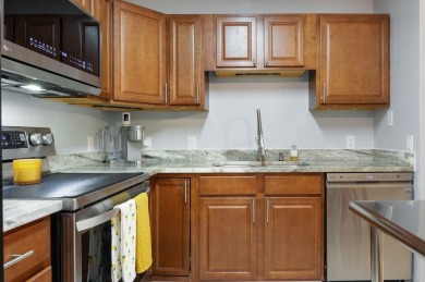 Welcome to resort-style living in this stunning fully renovated on Hunters Green Country Club in Florida - for sale on GolfHomes.com, golf home, golf lot
