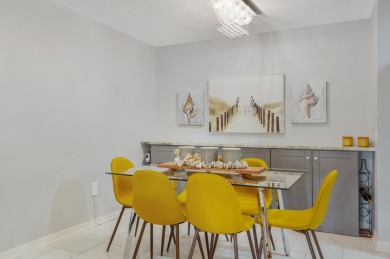 Welcome to resort-style living in this stunning fully renovated on Hunters Green Country Club in Florida - for sale on GolfHomes.com, golf home, golf lot