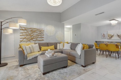 Welcome to resort-style living in this stunning fully renovated on Hunters Green Country Club in Florida - for sale on GolfHomes.com, golf home, golf lot
