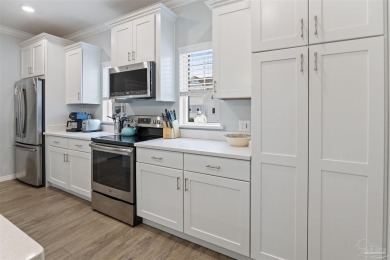 Embrace the coastal lifestyle at this furnished two-bedroom on Lost Key Golf Club in Florida - for sale on GolfHomes.com, golf home, golf lot