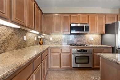 Welcome to this spacious 5-bedroom, 3-bathroom home in the on Menifee Lakes Country Club - Lakes in California - for sale on GolfHomes.com, golf home, golf lot