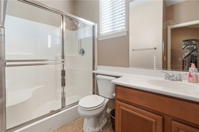 Welcome to this spacious 5-bedroom, 3-bathroom home in the on Menifee Lakes Country Club - Lakes in California - for sale on GolfHomes.com, golf home, golf lot