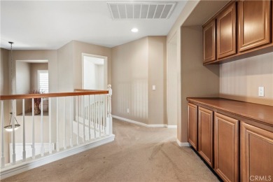 Welcome to this spacious 5-bedroom, 3-bathroom home in the on Menifee Lakes Country Club - Lakes in California - for sale on GolfHomes.com, golf home, golf lot