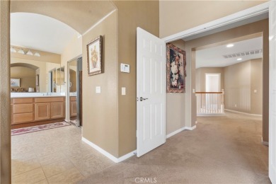 Welcome to this spacious 5-bedroom, 3-bathroom home in the on Menifee Lakes Country Club - Lakes in California - for sale on GolfHomes.com, golf home, golf lot
