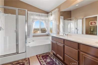 Welcome to this spacious 5-bedroom, 3-bathroom home in the on Menifee Lakes Country Club - Lakes in California - for sale on GolfHomes.com, golf home, golf lot
