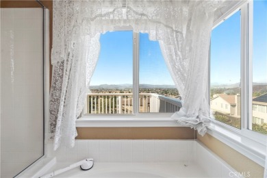 Welcome to this spacious 5-bedroom, 3-bathroom home in the on Menifee Lakes Country Club - Lakes in California - for sale on GolfHomes.com, golf home, golf lot