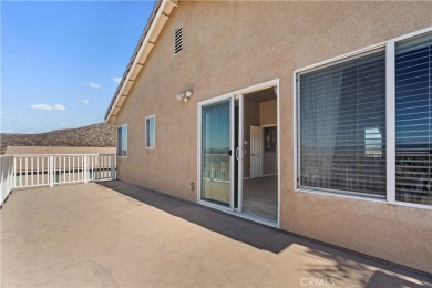 Welcome to this spacious 5-bedroom, 3-bathroom home in the on Menifee Lakes Country Club - Lakes in California - for sale on GolfHomes.com, golf home, golf lot