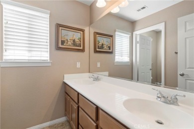 Welcome to this spacious 5-bedroom, 3-bathroom home in the on Menifee Lakes Country Club - Lakes in California - for sale on GolfHomes.com, golf home, golf lot