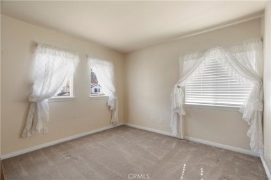 Welcome to this spacious 5-bedroom, 3-bathroom home in the on Menifee Lakes Country Club - Lakes in California - for sale on GolfHomes.com, golf home, golf lot